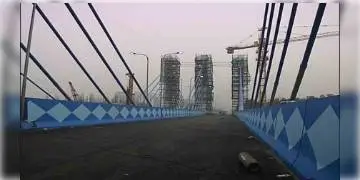 Read more about - ডিসেম্বরের শুরুতেই খুলতে পারে মাঝেরহাট ব্রিজ। দ্বিতীয় হুগলি সেতুর আদলে বসানো হচ্ছে কেবল।  