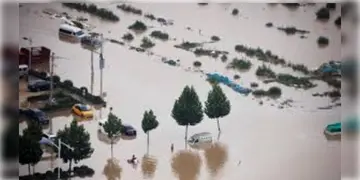 Read more about - China Flood | টানা বৃষ্টির জের, চিনে ভয়াবহ বন্যা পরিস্থিতি, মৃতের সংখ্যা বেড়ে দাঁড়িয়েছে ৬০-এ